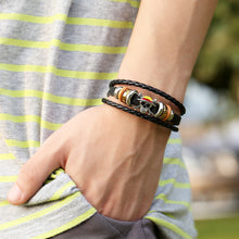 Load image into Gallery viewer, Punk Braided Leather Bracelet Simple Multi-Layer Ghost Head a Pair of Buckles Bracelet