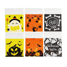 Load image into Gallery viewer, 100Pcs Halloween Plastic Candy Bag Skull Pumpkin Ghost Opp Transparent Gift Bag for Halloween Party Cookie Biscuit Packaging Bag