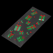 Load image into Gallery viewer, 50Pcs Xmas Cookie Packing Bags Christmas Cellophane Party Bags Treat Candy Bag Festival Party Favor Gift Merry Christmas Hallowe