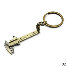 Load image into Gallery viewer, Arrival Measuring Tools Stainless Steel Retractable Ruler Tape Measure Keychain Key Ring Gauging Tools Keyring Pull Ruler