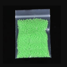 Load image into Gallery viewer, 10g Party DIY Fluorescent Super luminous Particles Glow Pigment Bright Gravel Noctilucent Sand Glowing in the Dark Sand Powder
