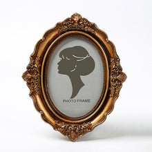 Load image into Gallery viewer, European-Style Carved Resin Photo Frame Oval Retro Distressed Photo Frame and Picture Frame Wall Mounted Bronze Photo Frame
