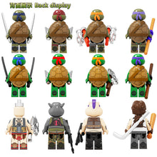 Load image into Gallery viewer, Kf6125 Teenage Mutant Ninja Turtles Series Michelangelo Boar Assembled Building Blocks Children's Educational Toys
