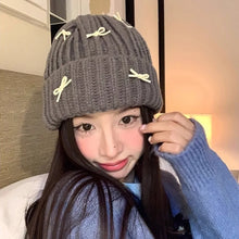 Load image into Gallery viewer, Warm Ear Protection Bow Knitted Hat Cold-proof Korean Style Pullover Hat Cute Bow Thick Bow Winter Hat Autumn
