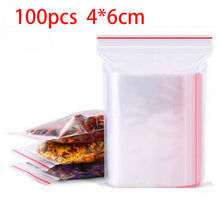 Load image into Gallery viewer, 100pcs/pack Resealable Zip Lock Bags Self Seal Clear Plastic Poly  Bag Food Storage Package Reclosable Vacuum Fresh Bag
