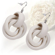 Load image into Gallery viewer, Vintage Oak Earrings Female Personality Spiral Ring Earrings Jewelry
