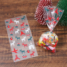 Load image into Gallery viewer, 50Pcs Xmas Cookie Packing Bags Christmas Cellophane Party Bags Treat Candy Bag Festival Party Favor Gift Merry Christmas Hallowe
