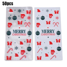 Load image into Gallery viewer, 50Pcs Xmas Cookie Packing Bags Christmas Cellophane Party Bags Treat Candy Bag Festival Party Favor Gift Merry Christmas Hallowe
