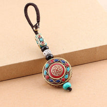 Load image into Gallery viewer, Tibetan Buddha Pendant Keychain Keyring Om Ohm Aum Buddhist Mantra Sign Yoga Charm Car Key Chain For Women Nepal Ethnic Jewelry
